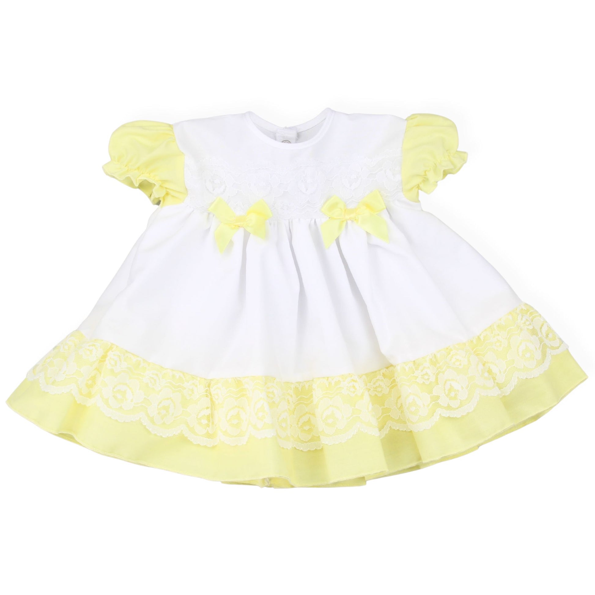 White dress with yellow accents on a white background