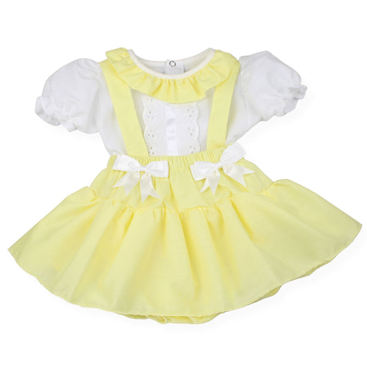 Yellow dress with white ruffled sleeves on a white background
