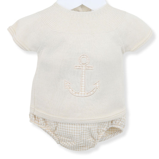 Baby romper with anchor design on a white background