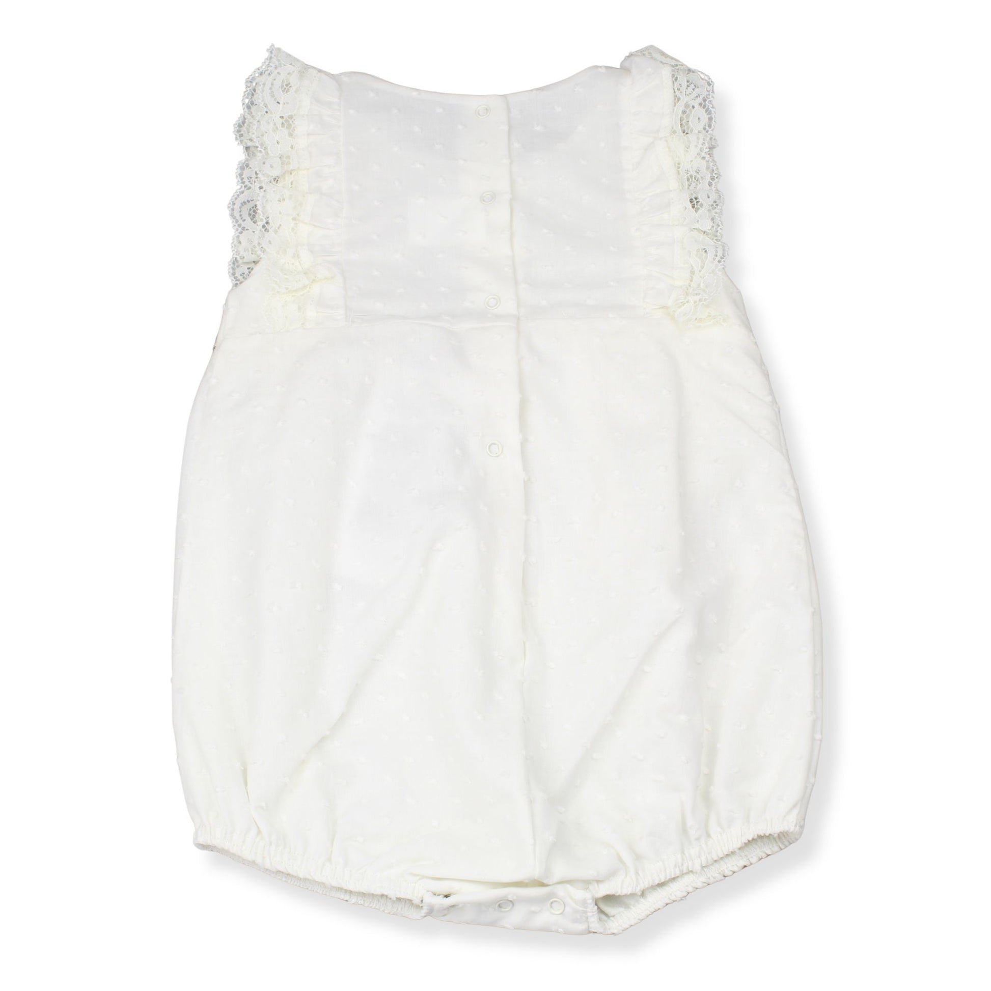 White baby romper with lace details on a white background