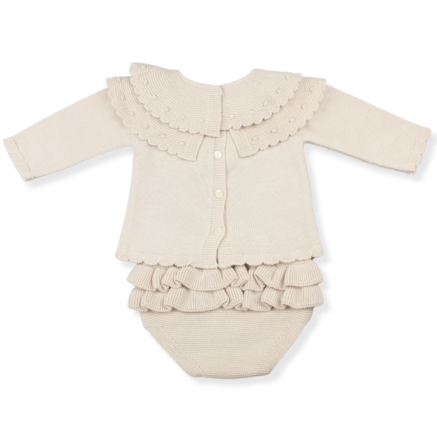Beige baby outfit with ruffled details on a white background