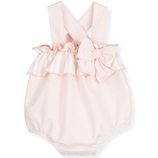 Pink baby romper with bow details on a white background