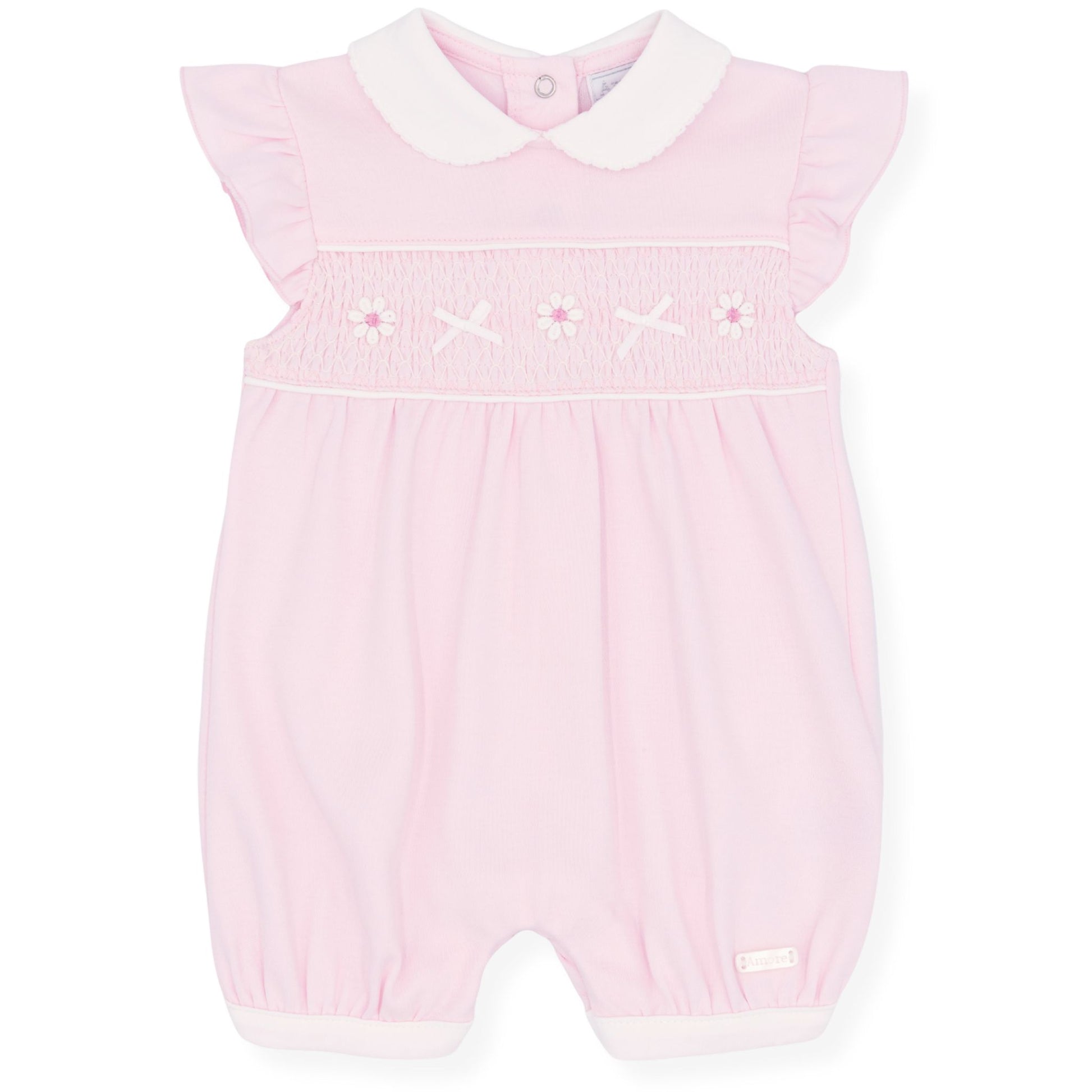Pink baby romper with white collar on a white background