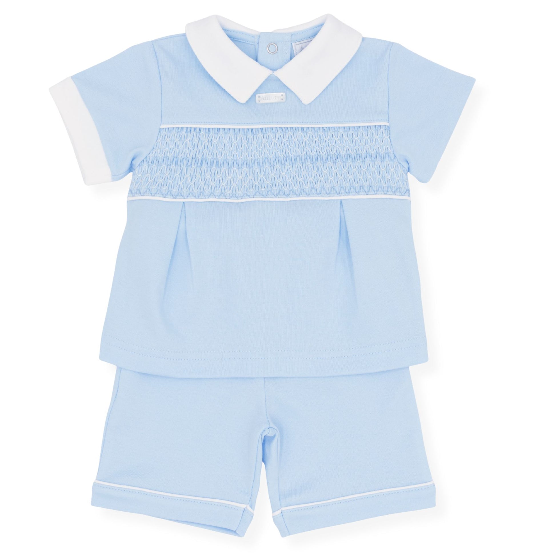 Light blue children's outfit with white collar on a white background
