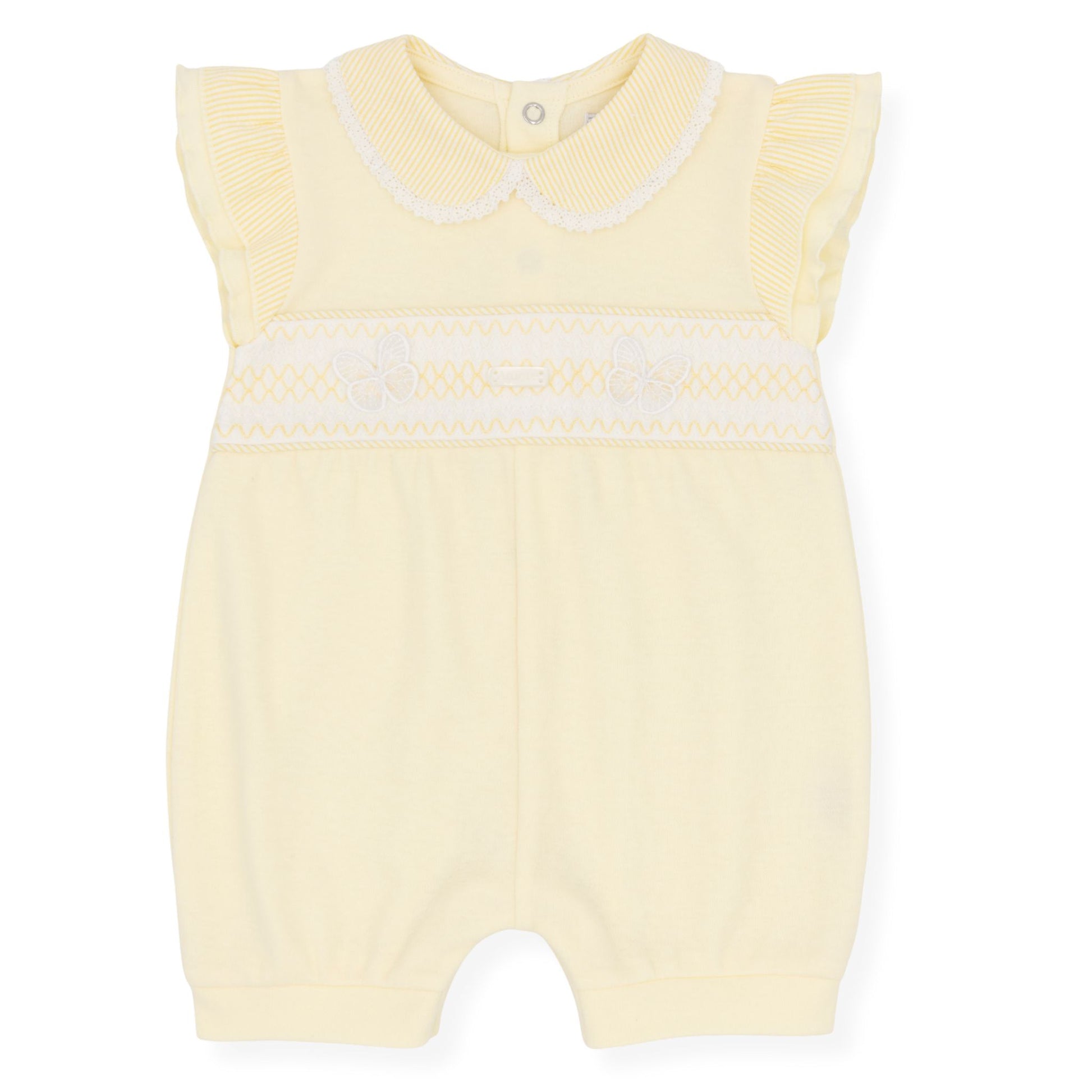 Yellow baby romper with white trim on a white background
