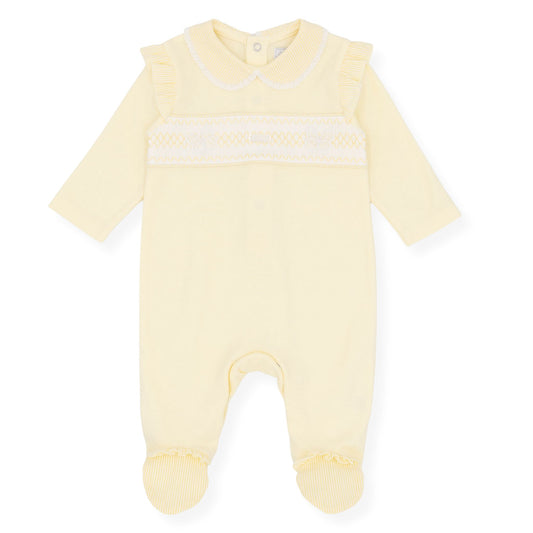 Yellow baby onesie with a white stripe on a white background