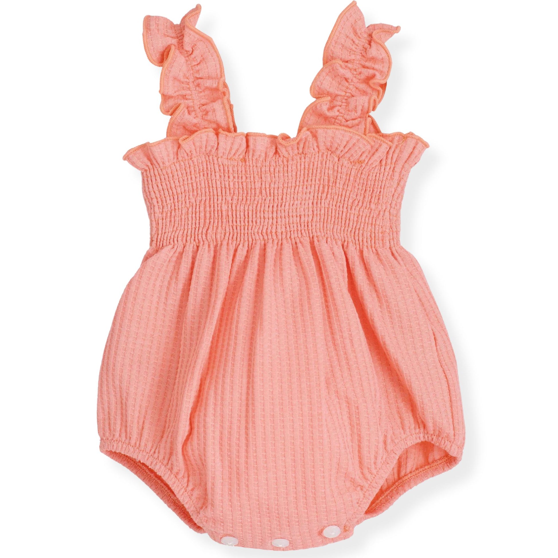 Coral baby romper with ruffled straps on a white background