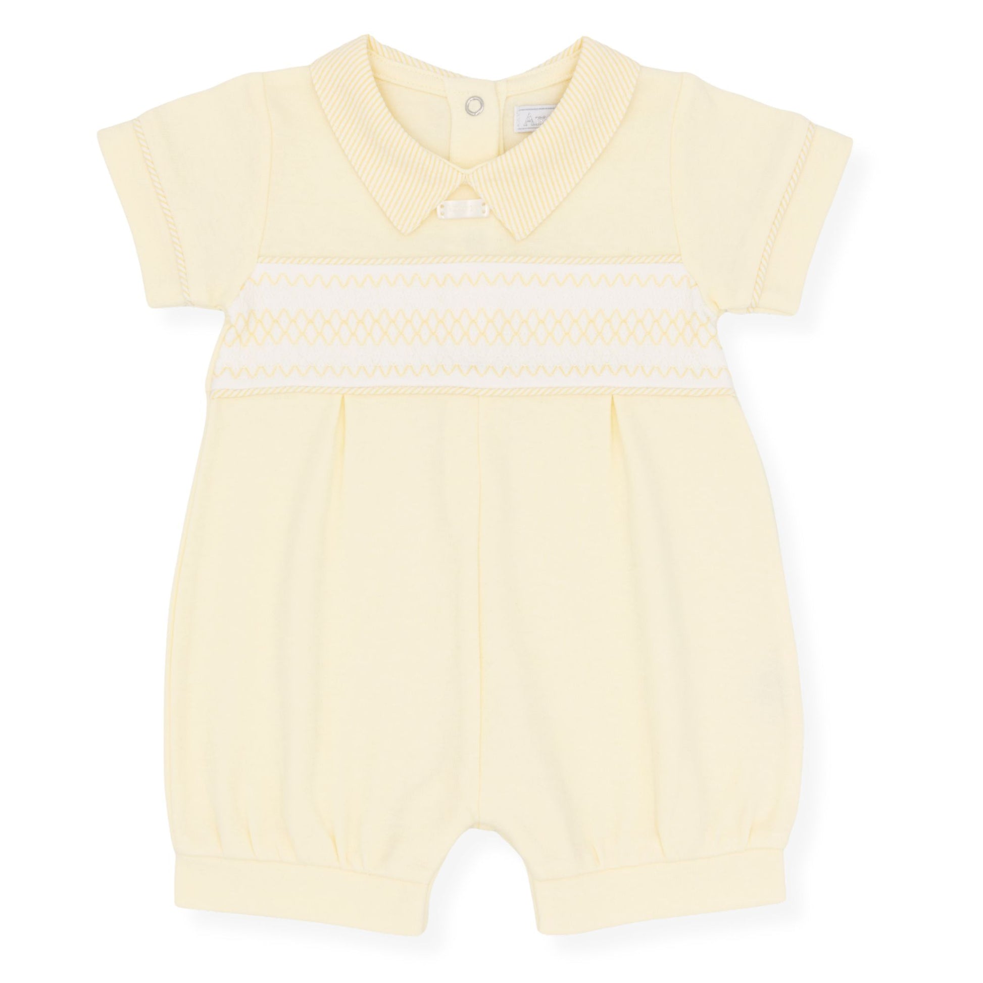 Yellow baby romper with white trim on a white background