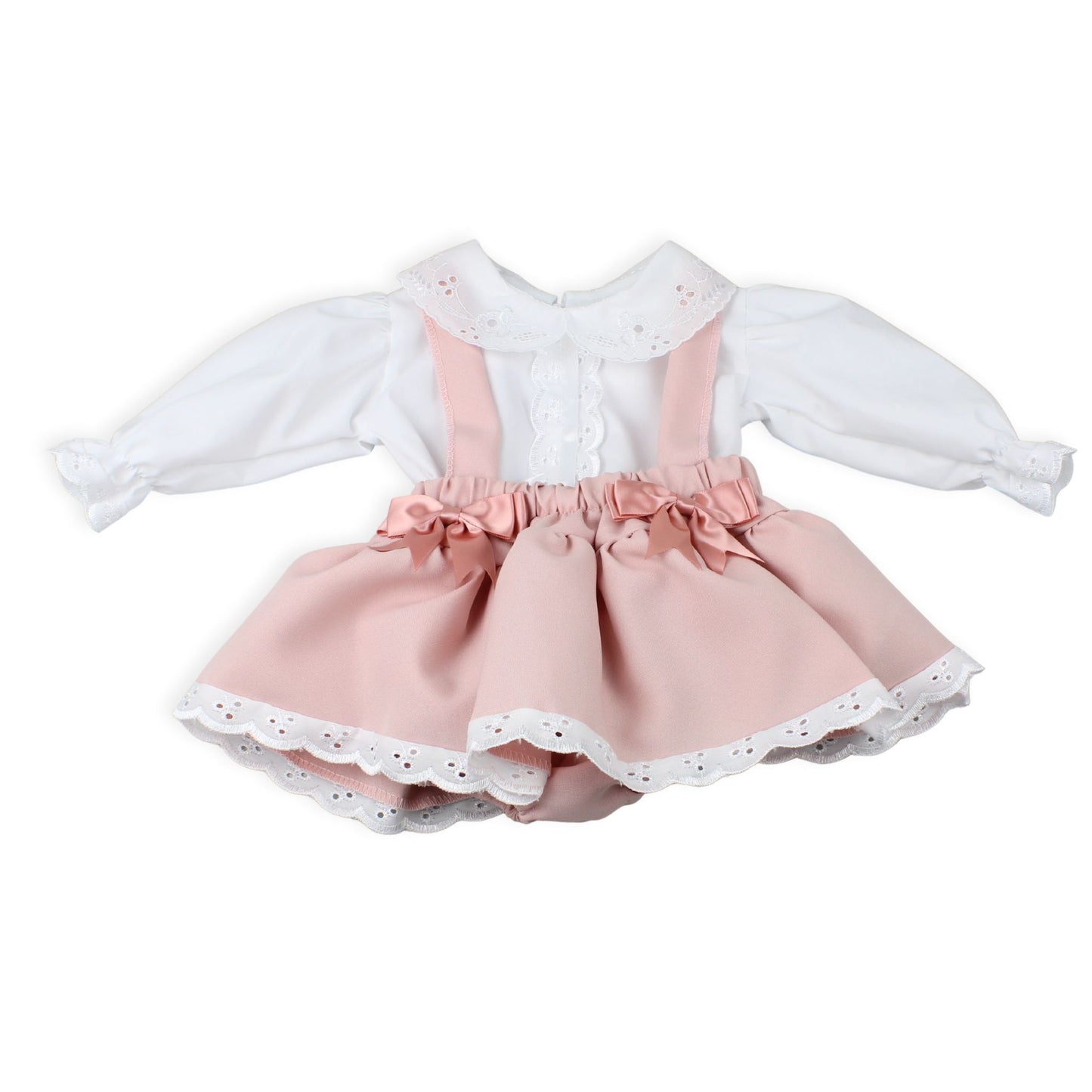 Pink and white dress with ruffled details on a white background