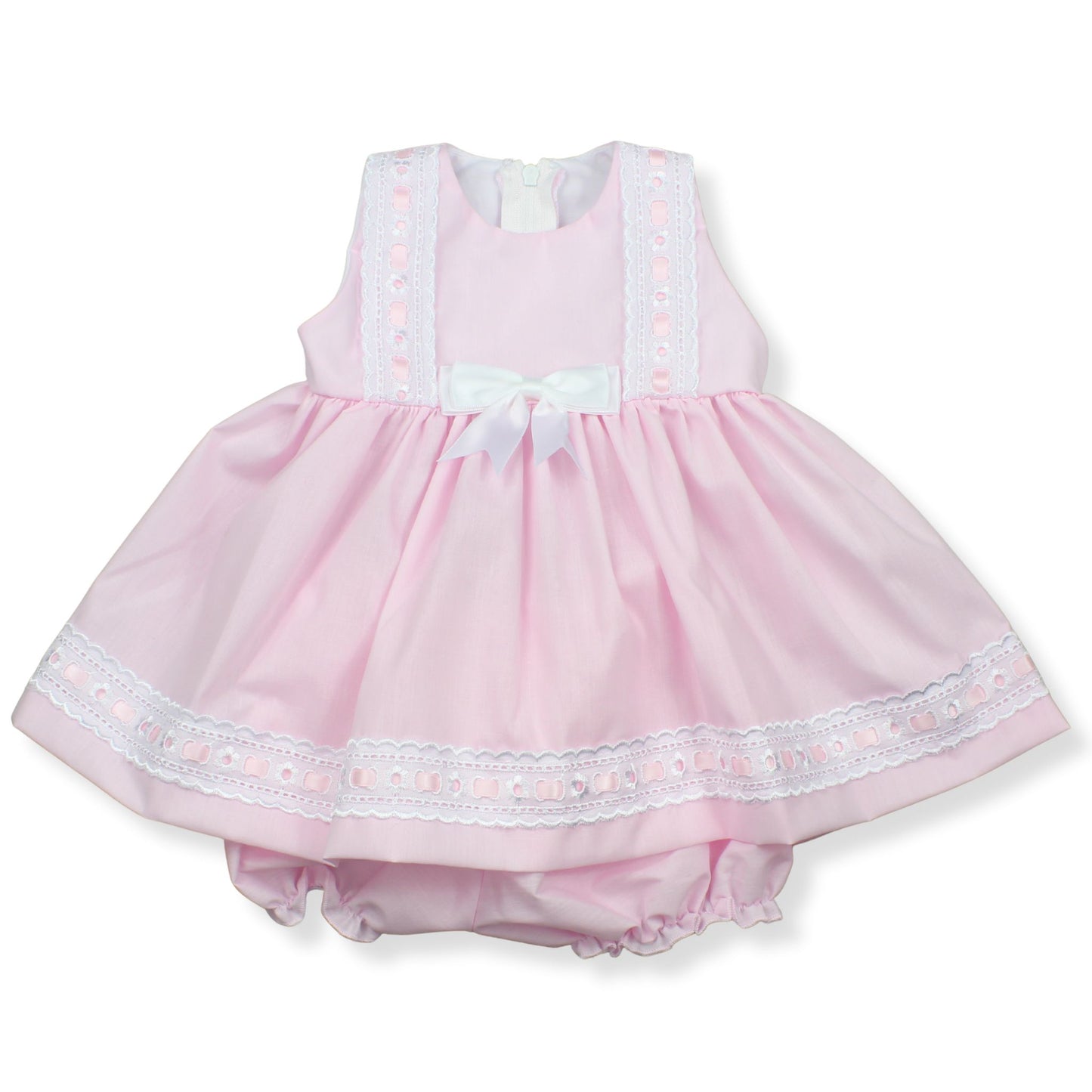 Pink baby dress with white lace trim on a white background