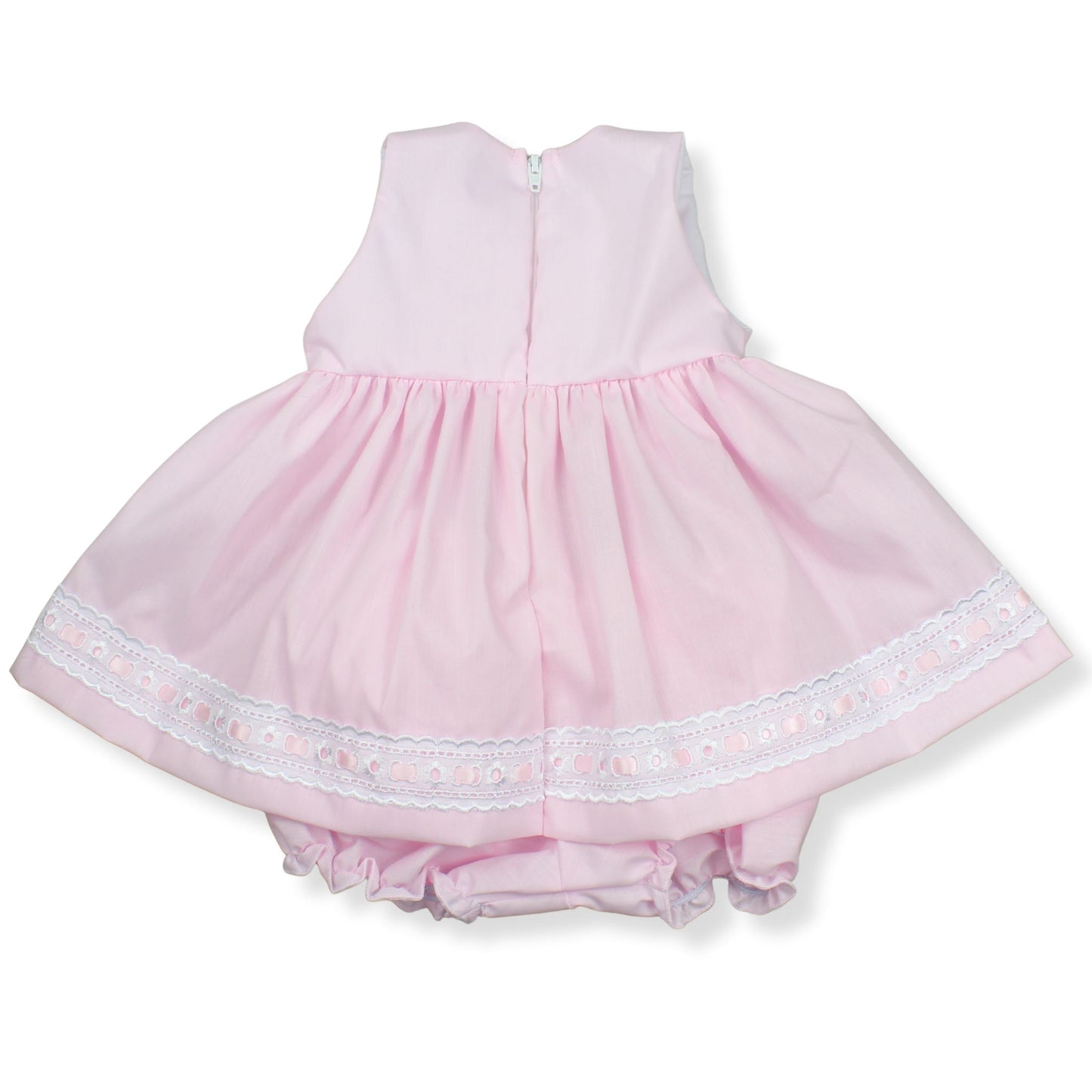 Pink baby dress with lace trim on a white background