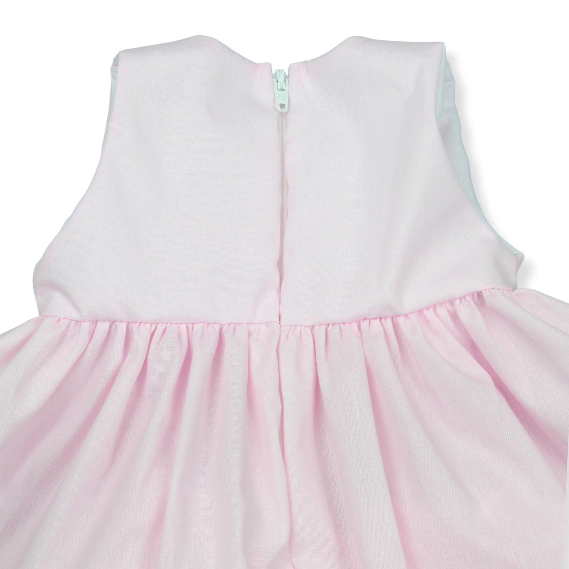 Pink dress with a zipper back on a white background