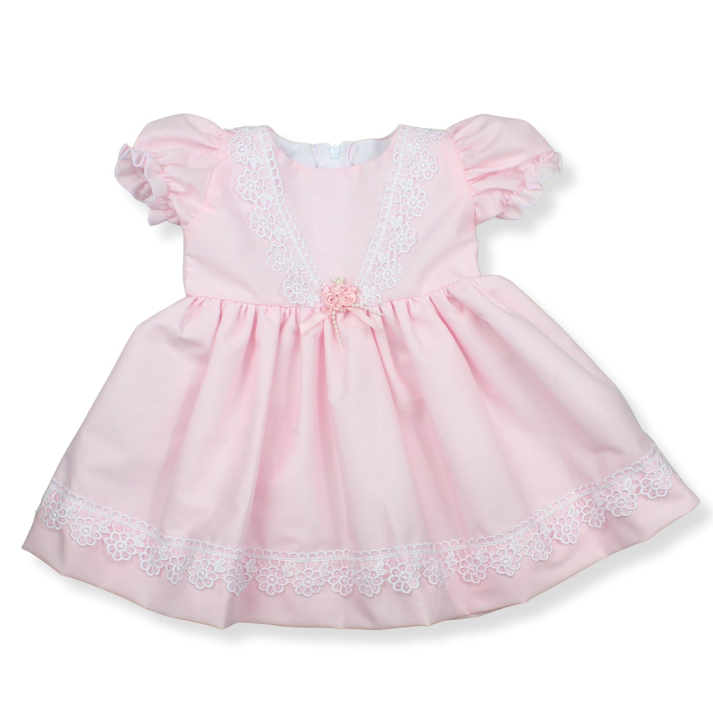 Pink baby dress with lace details on a white background