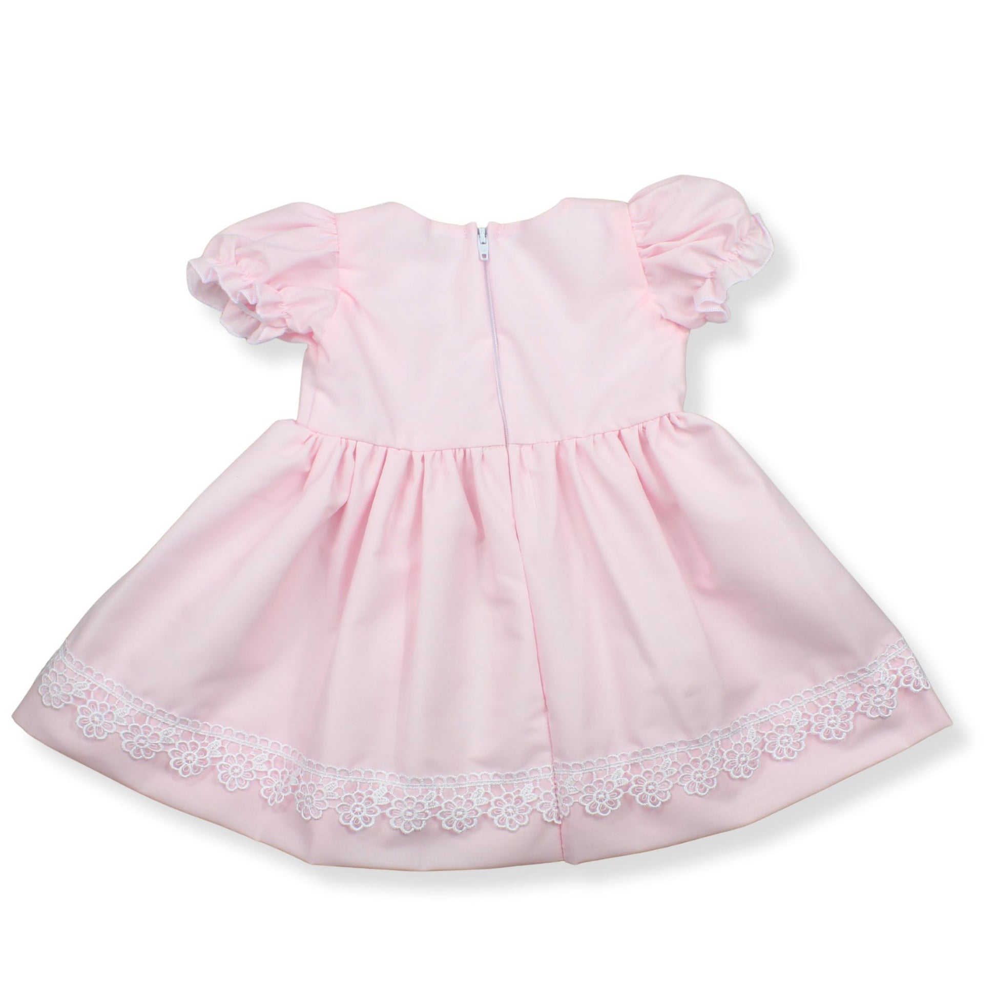 Pink dress with lace trim on a white background