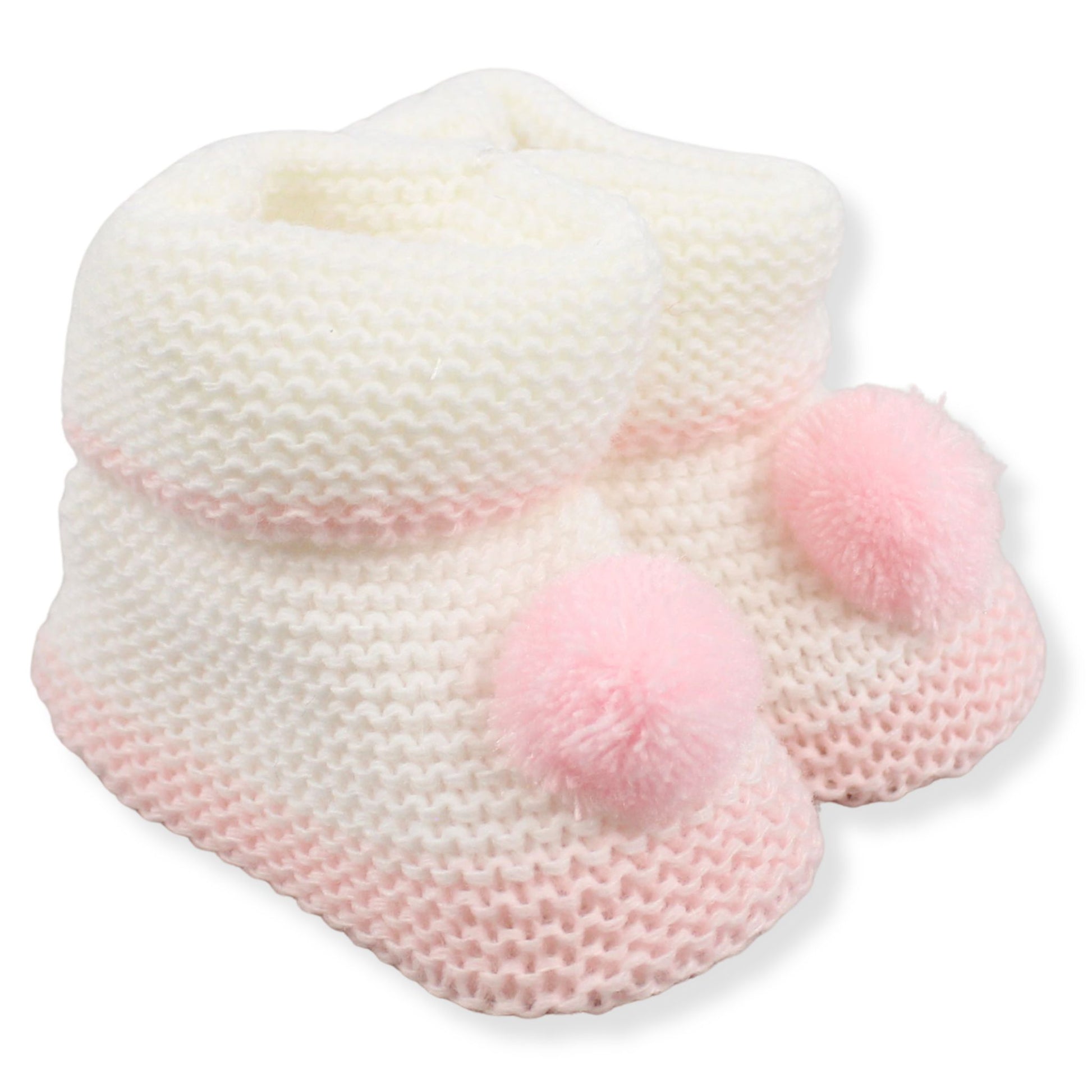 White and pink knitted baby booties with pom-poms on a white background