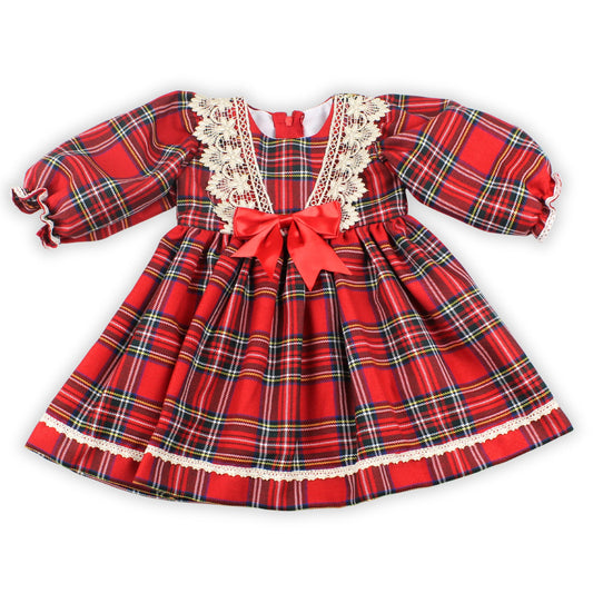 Red plaid dress with lace details and a bow on a white background
