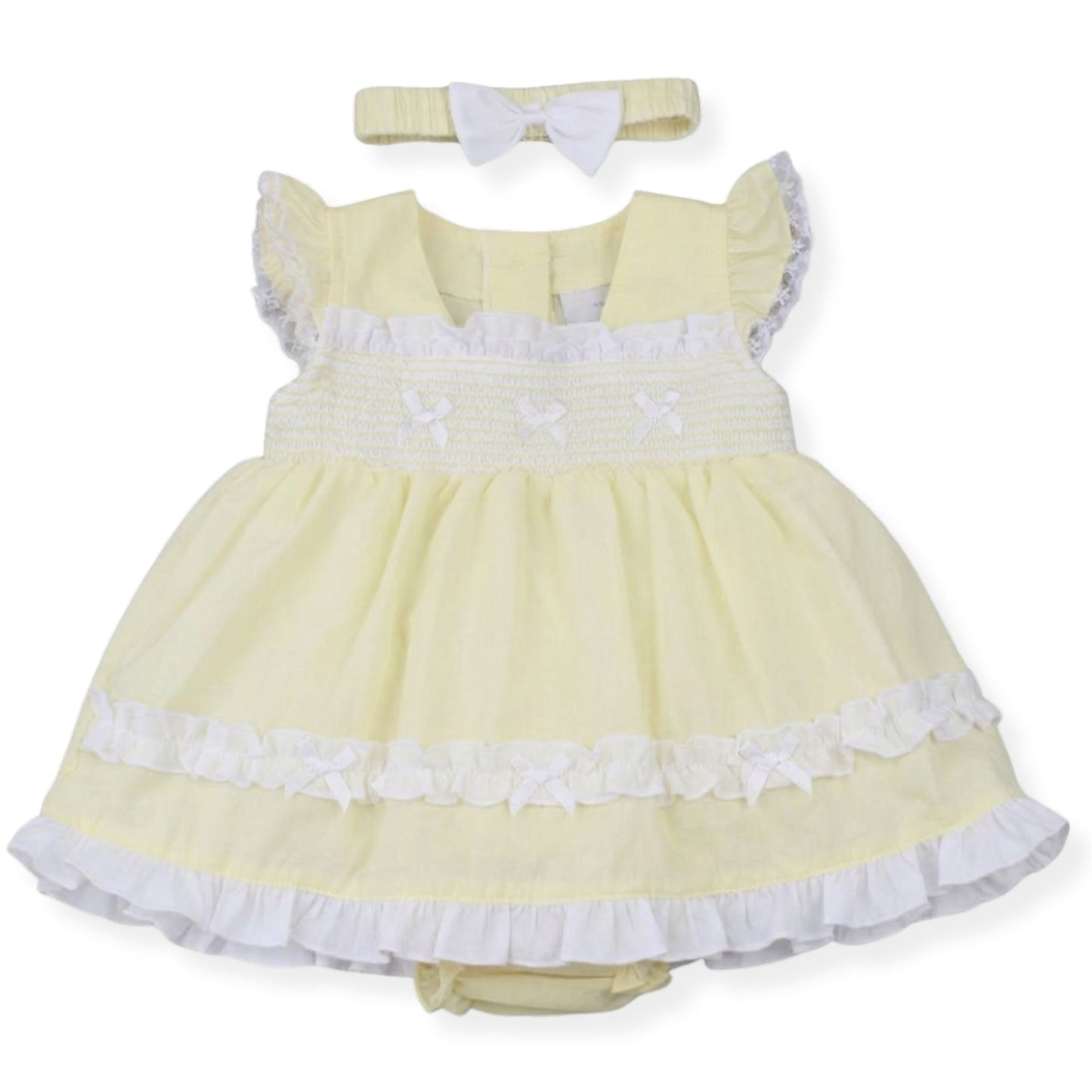 Yellow dress with white trim and matching headband on a white background