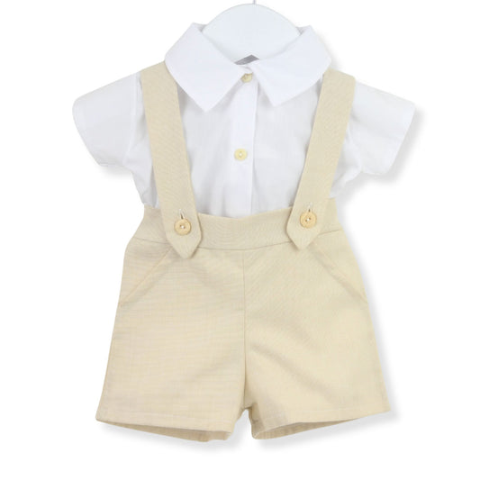 Children's outfit with beige shorts and braces on a white background