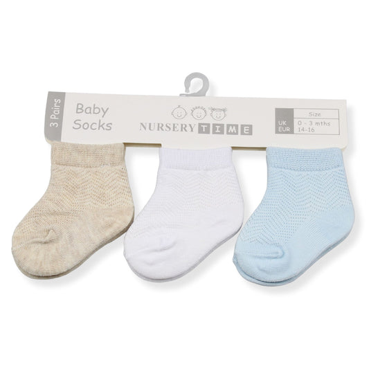 Three pairs of baby socks on a 'Nursery Time' branded card against a white background.