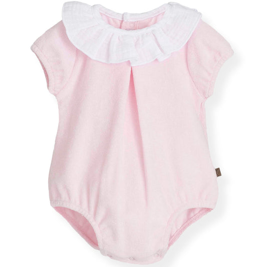 Pink baby romper with white collar on a white background