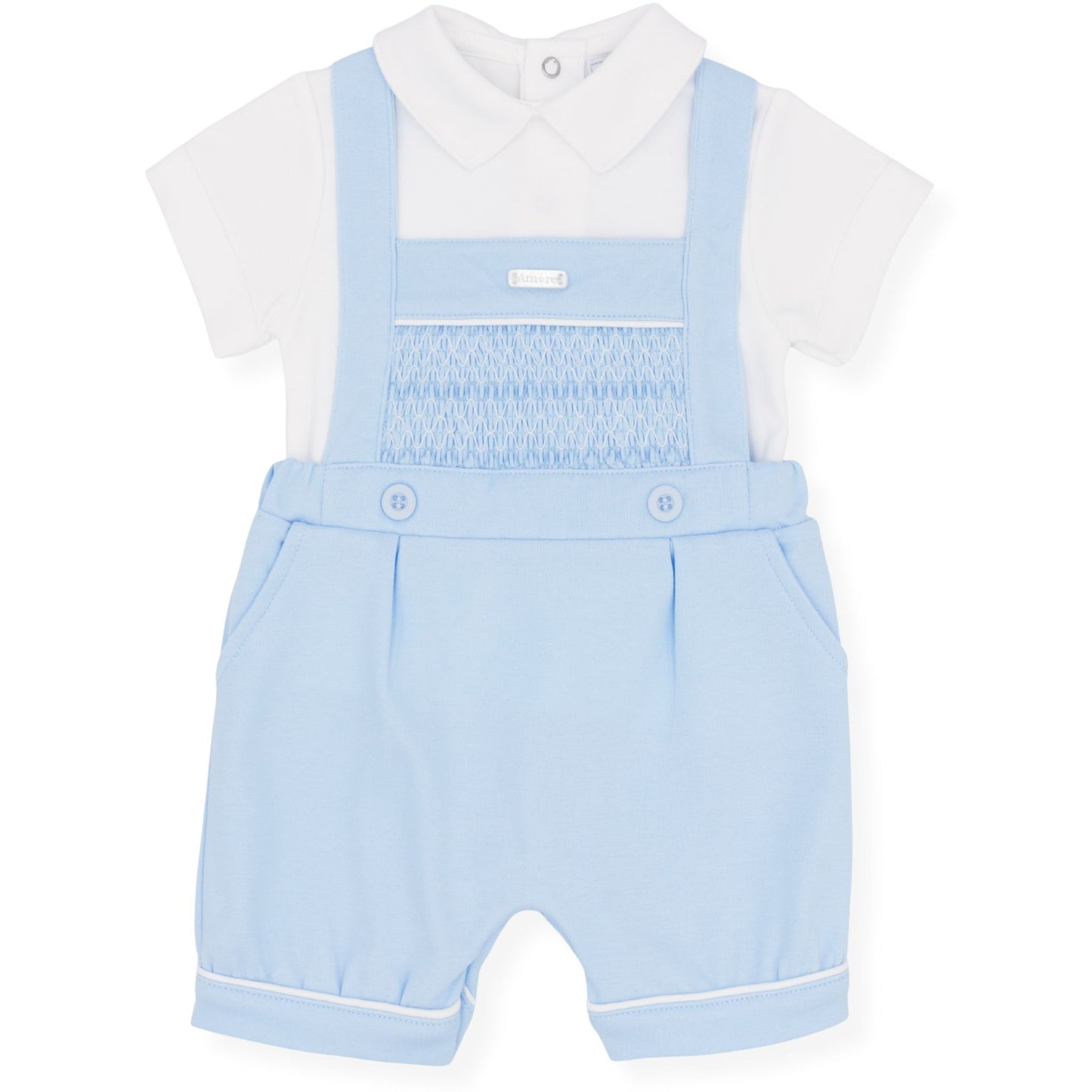 Baby outfit with light blue smocked romper and white shirt on a white background