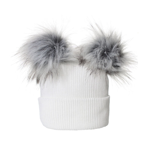 White knit beanie with gray faux fur pom-poms on a white background