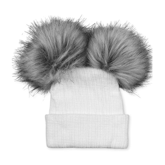 White beanie with two large gray fur pom-poms on a white background