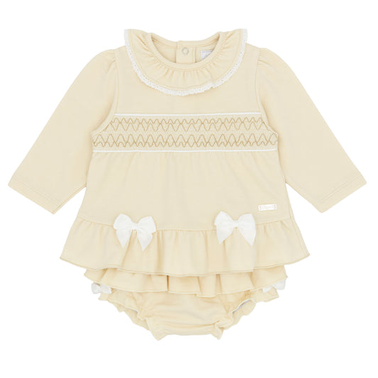 Amore baby girls beige smocked dress and knickers outfit with white bows and frilled collar