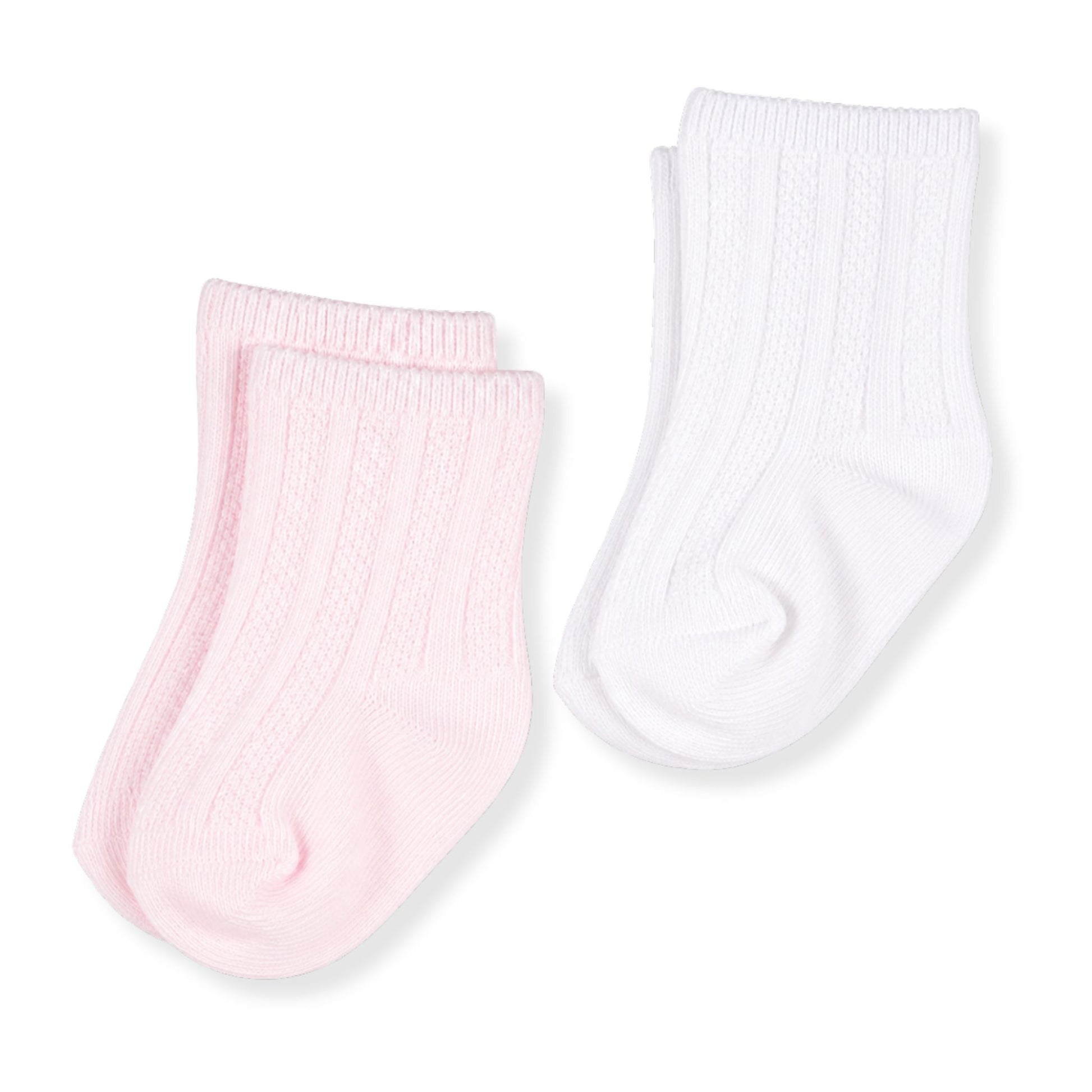 Two pairs of baby socks, one pink and one white, on a light gray background.