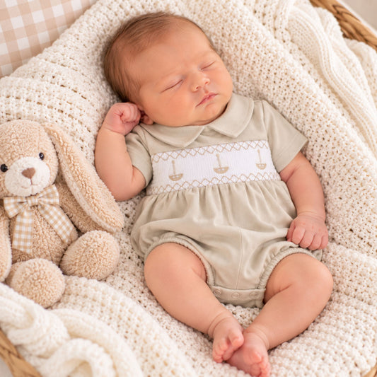 Little Nosh Beige Smocked Baby Romper with Embroidered Boat Detail