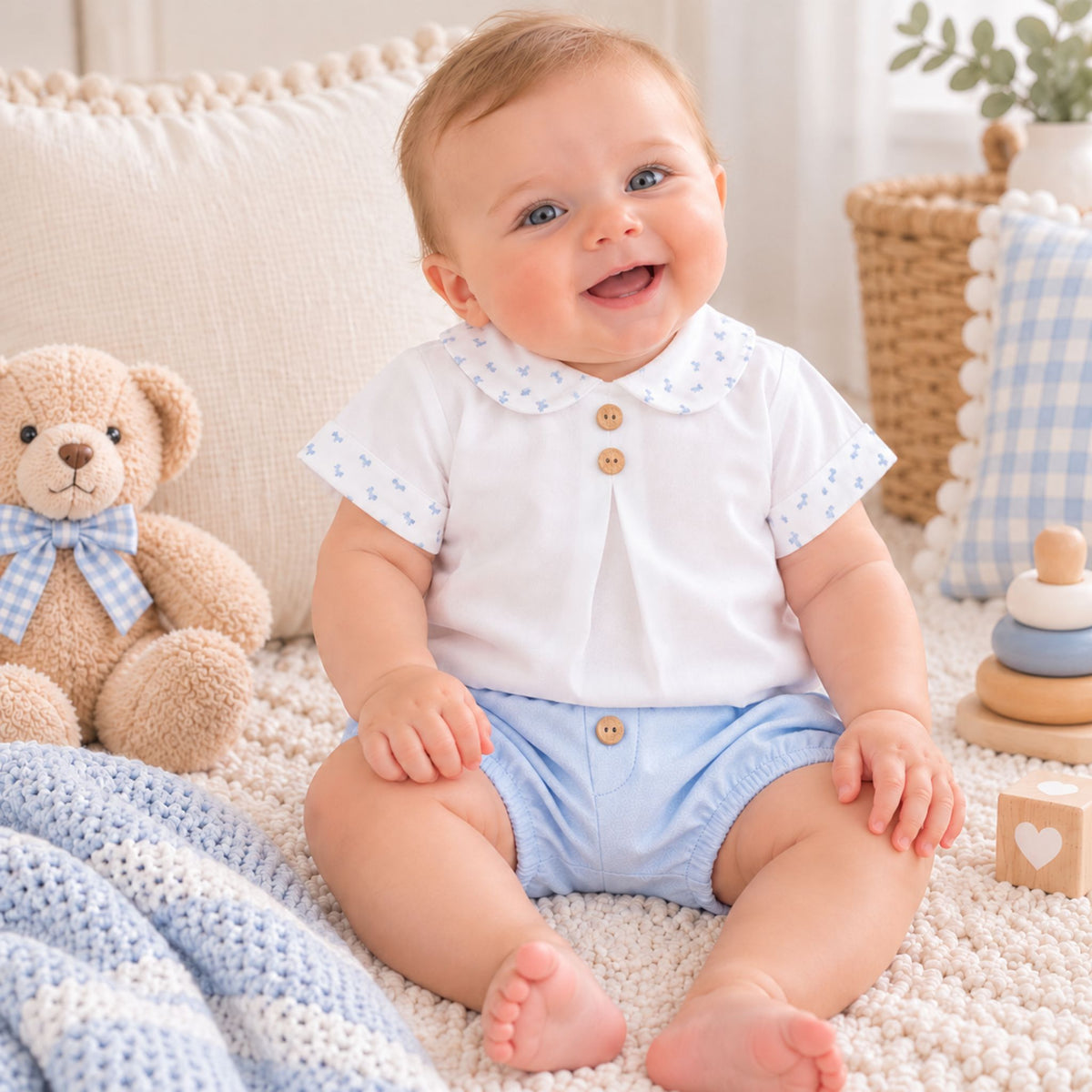 baby boy in white shirt and blue shorts by calamaro