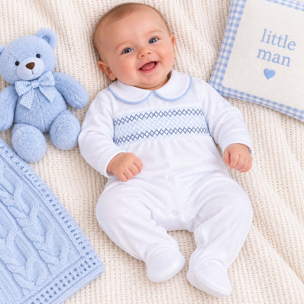 White Cotton Smocked Baby Sleepsuit with Blue Embroidery