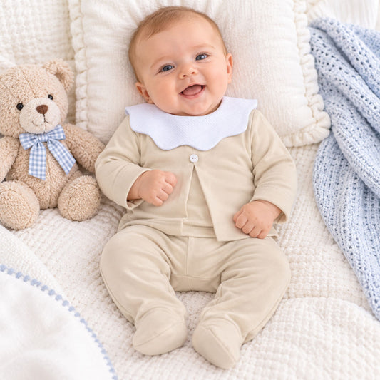 baby boy in beige cotton two piece outfit