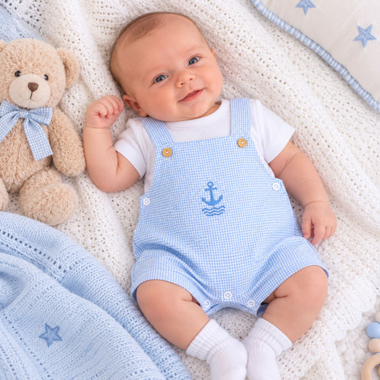 baby boy in gingham dungaree romper with t shirt