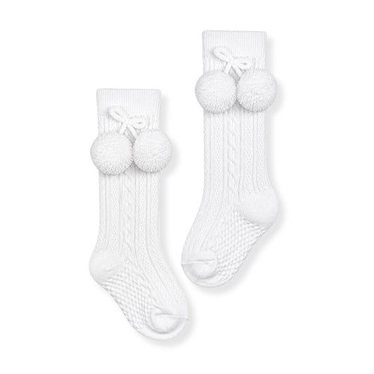 baby boy white  knee high pom pom socks in a spanish style