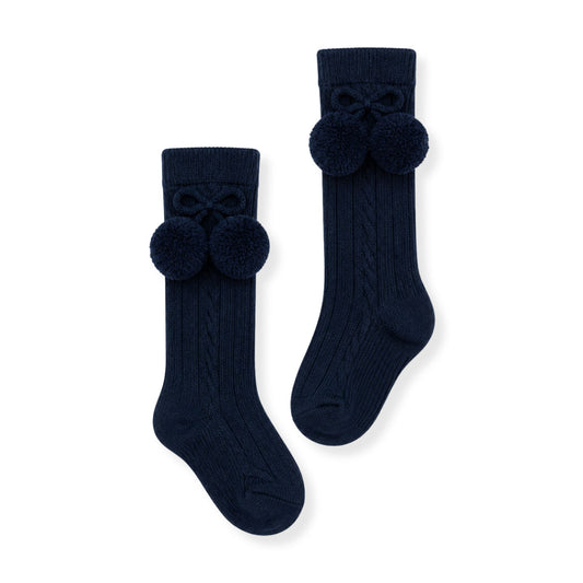 baby boys navy knee high ankle socks with pom poms in a spanish style