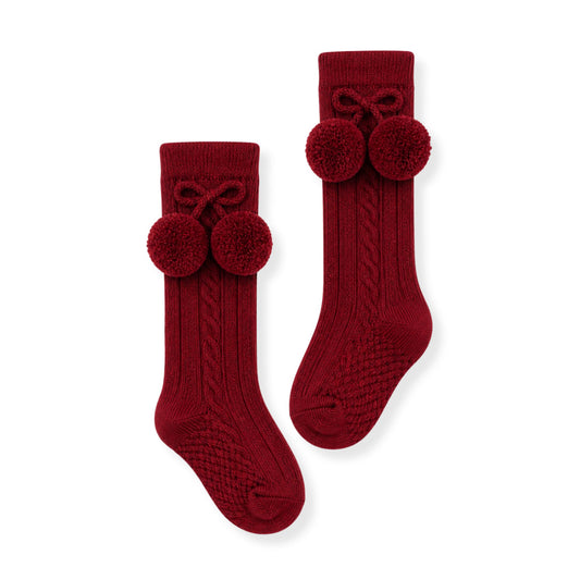 baby boy burgundy khnee high socks with pom poms in a spanish style
