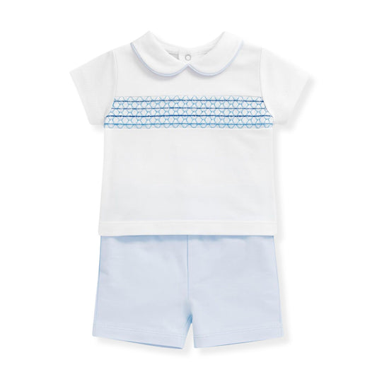 Baby outfit with white shirt and light blue shorts on a white background