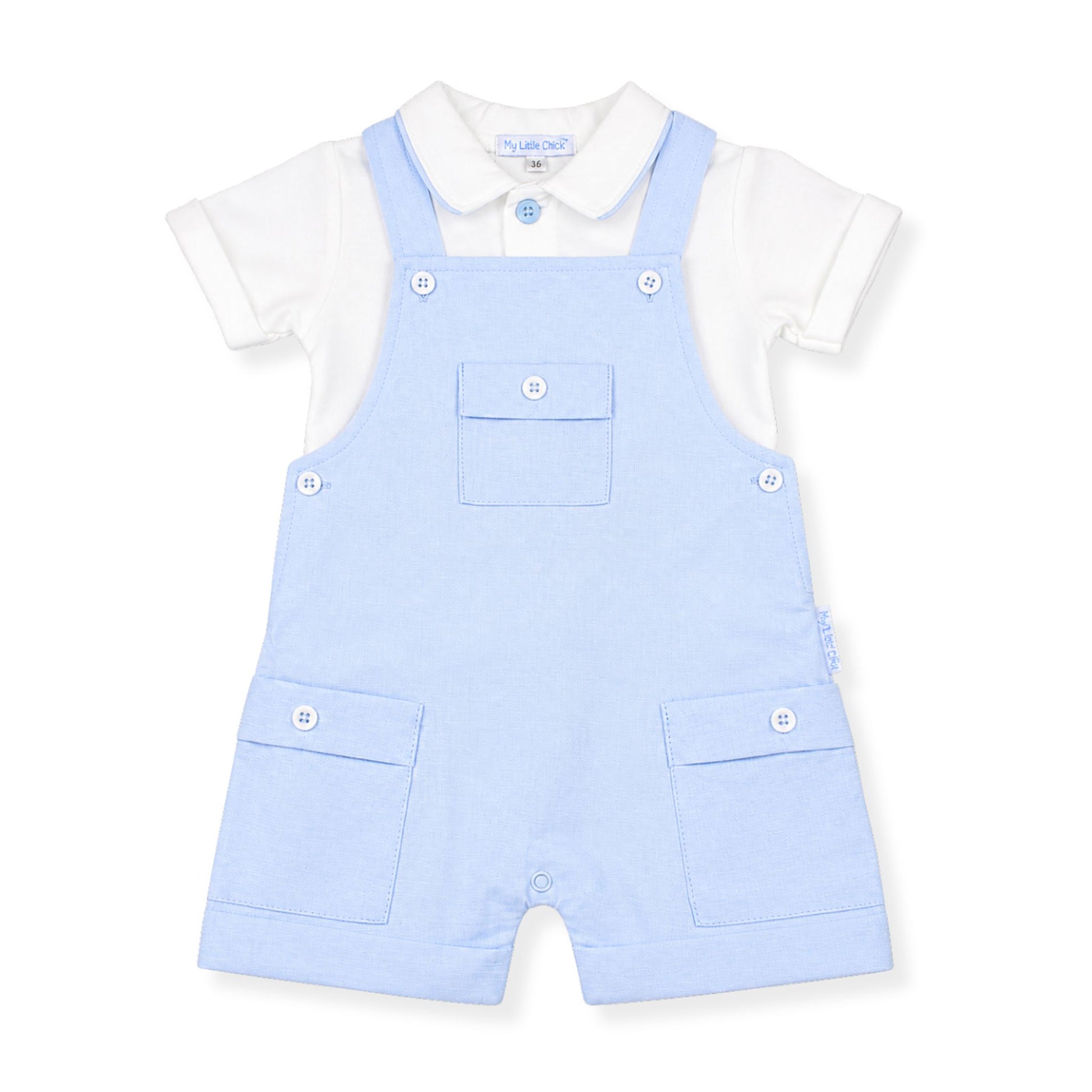 Light blue baby boy dungarees with a white shirt on a white background