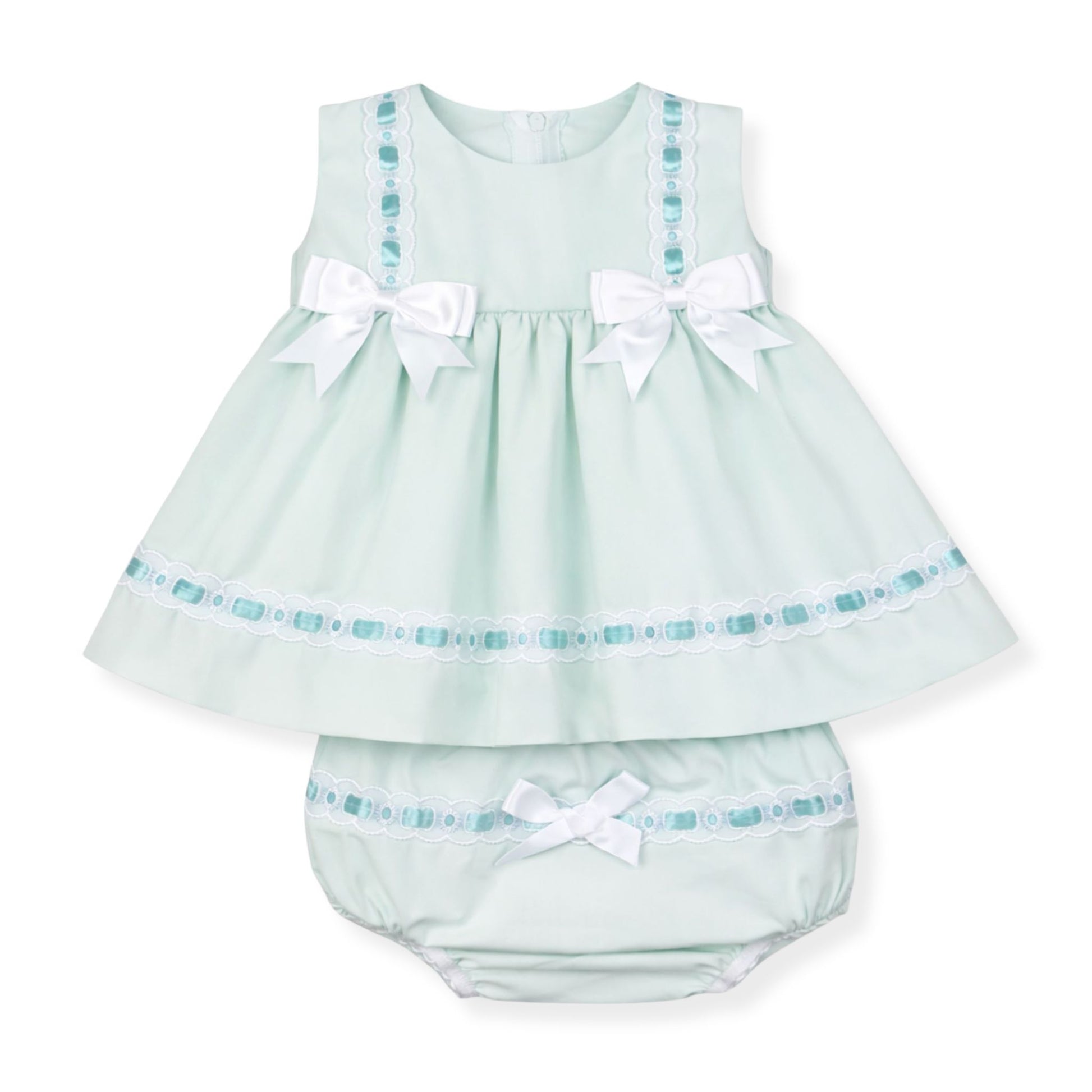 mint green baby dress with white bows and matching bloomers on a white background