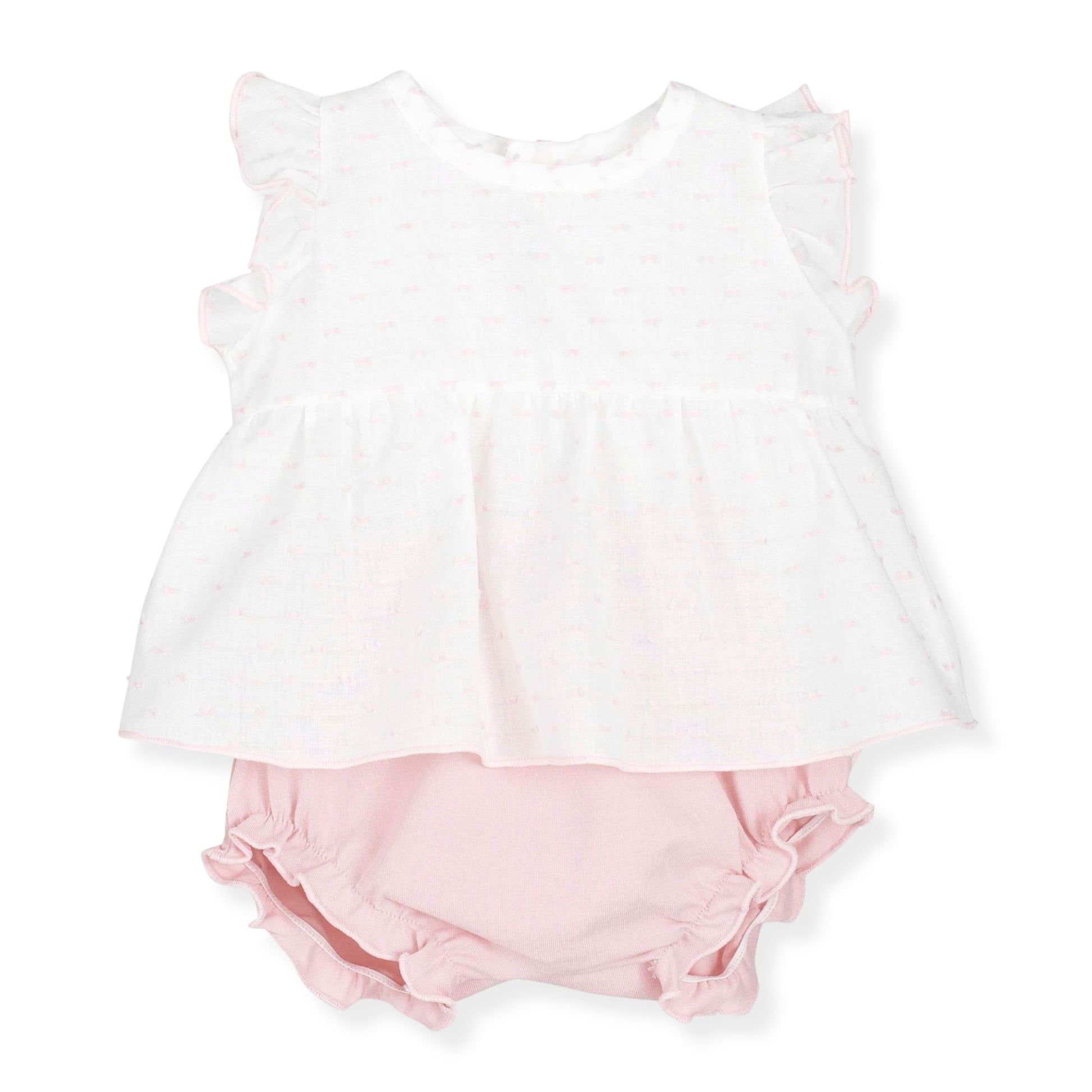 White sleeveless top and pink bloomers on a white background