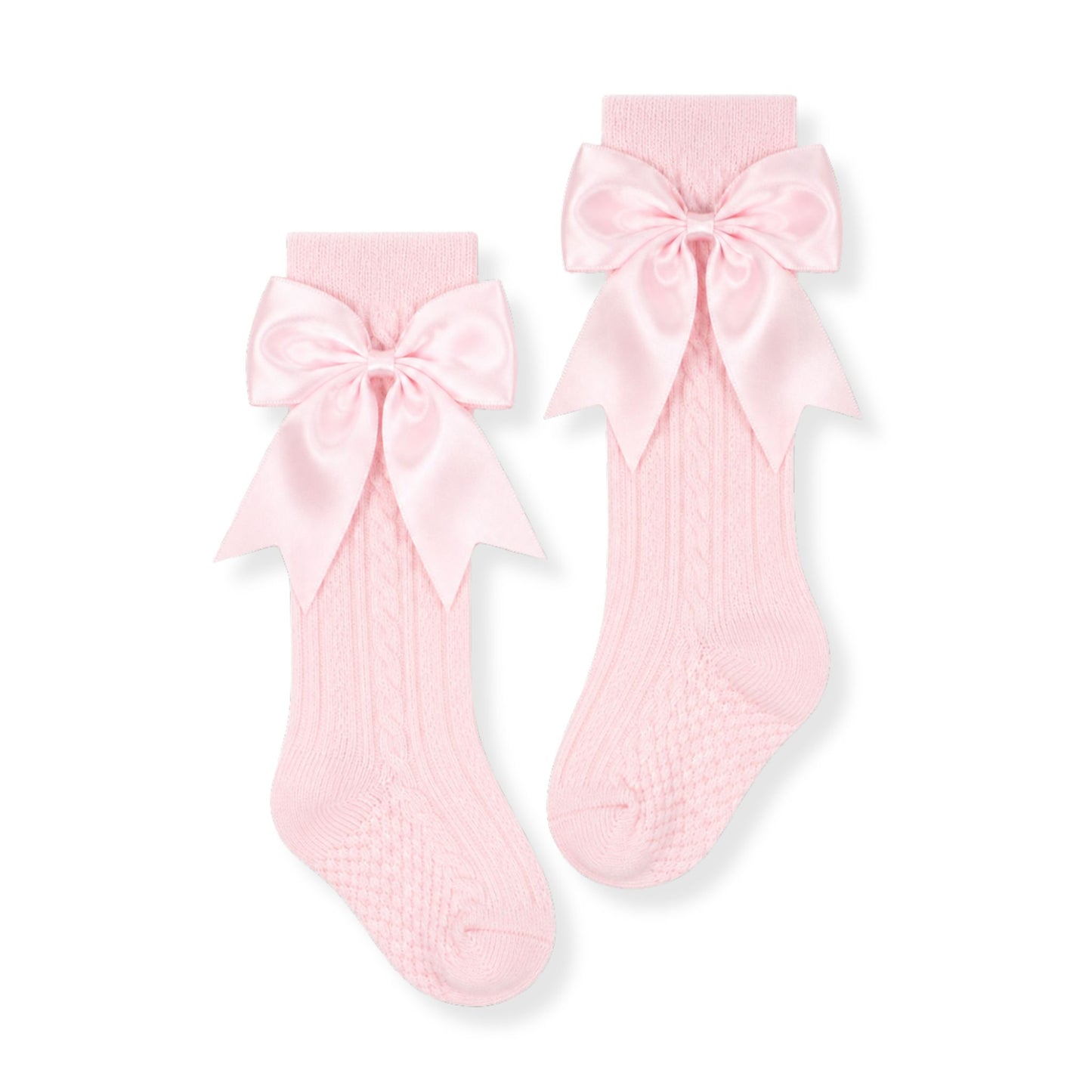 baby girl pink knee high socks with bows in a spanish style