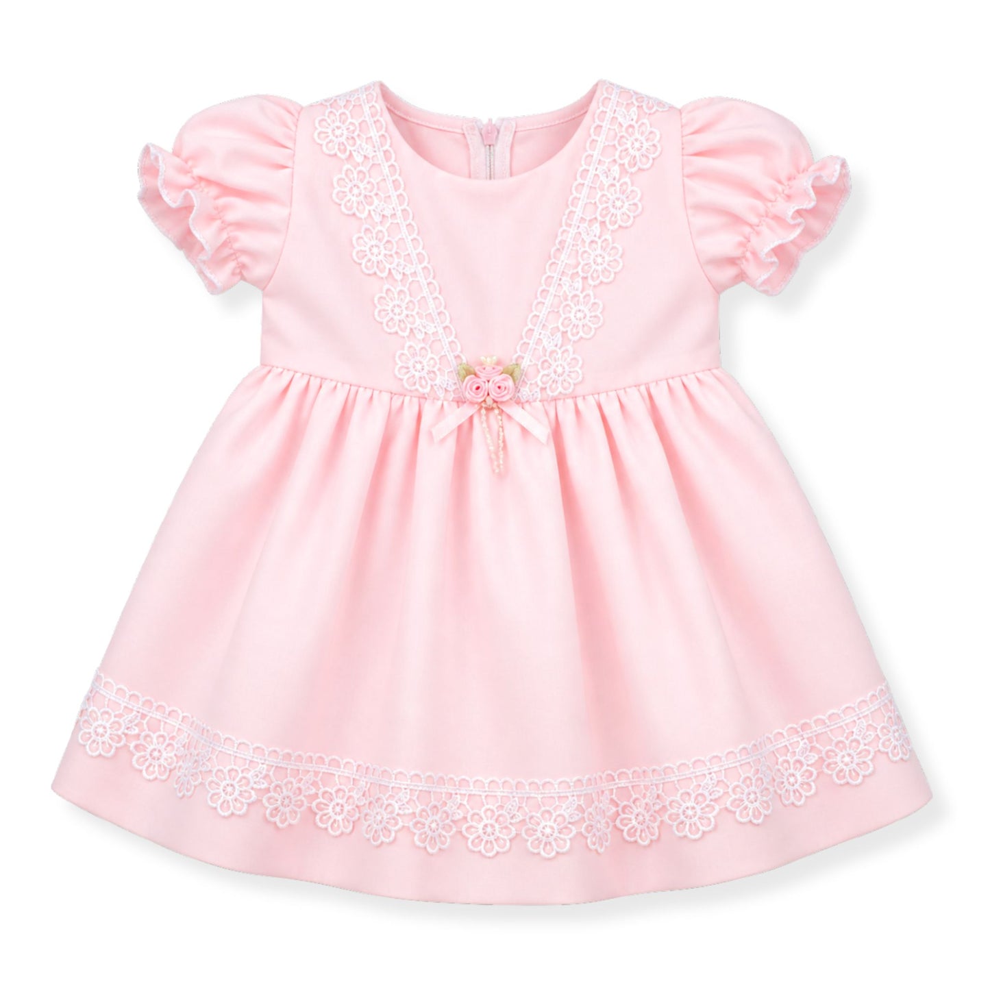 Pink baby dress with lace details on a white background