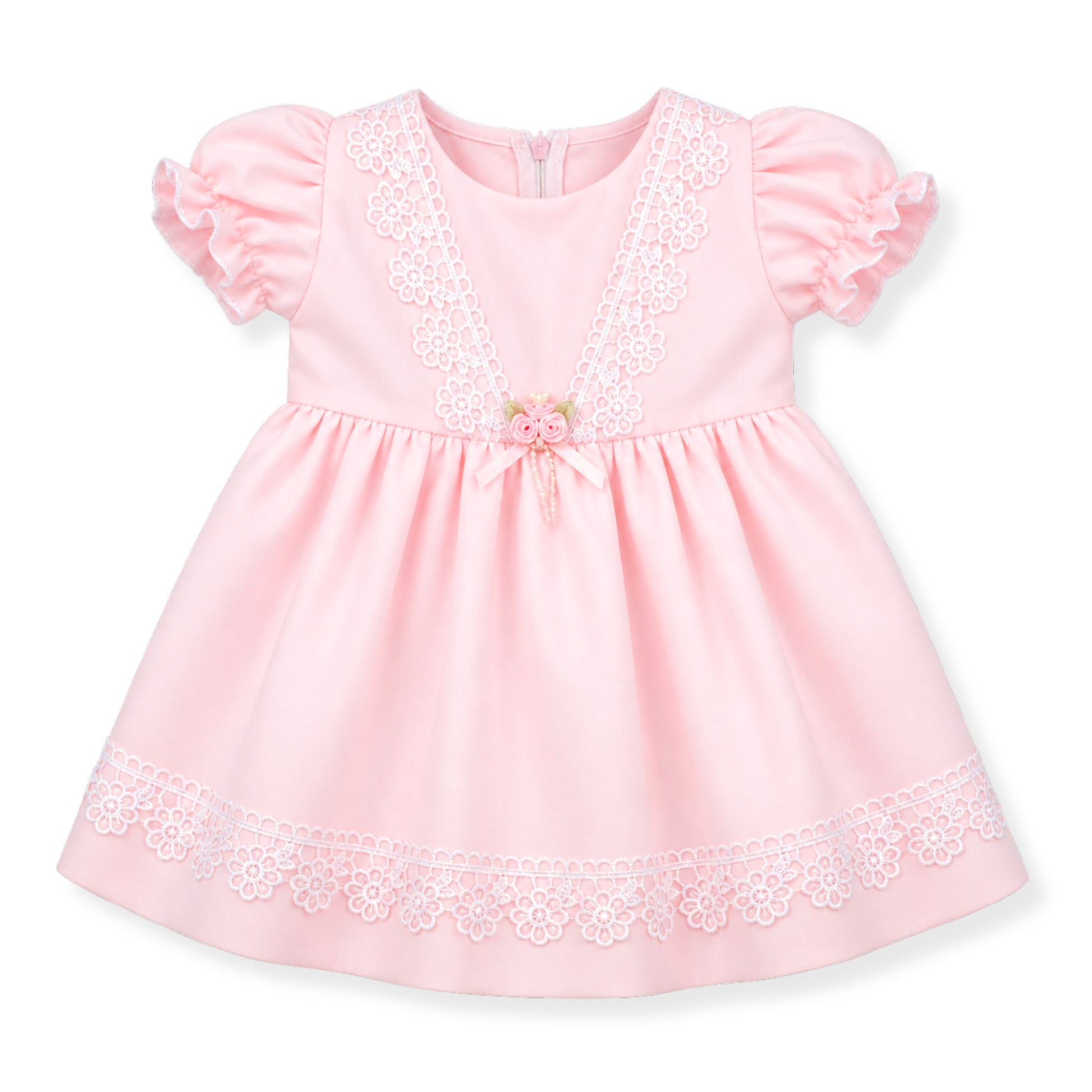 Pink baby dress with lace details on a white background