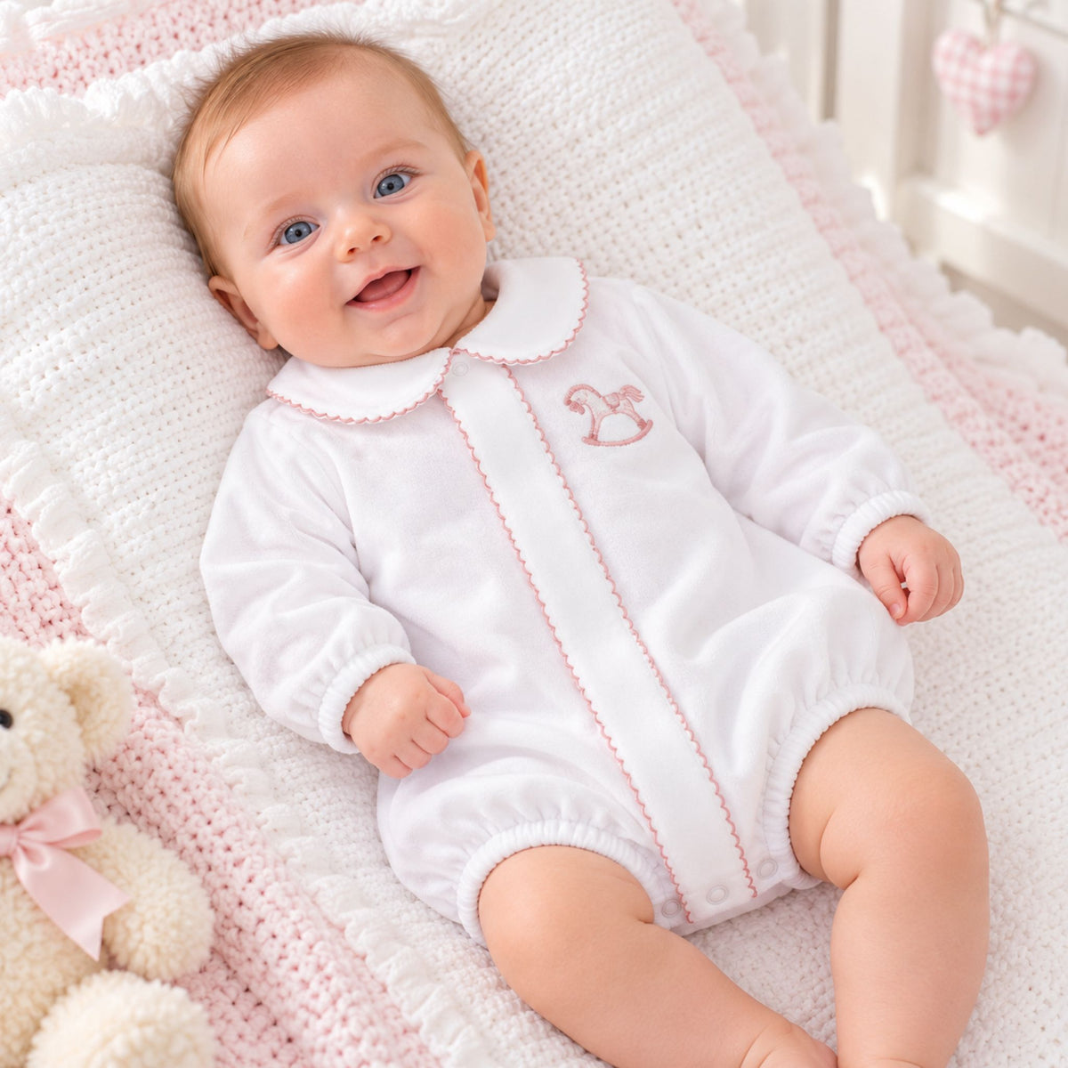 Dandelion baby girls white velour romper with pink piping and embroidered rocking horse