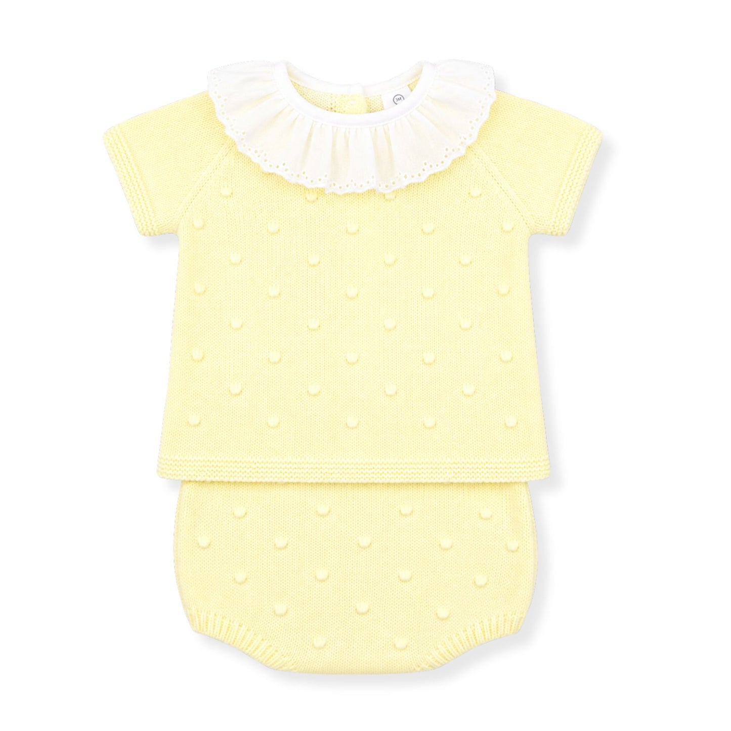 Yellow baby outfit with white collar on a white background