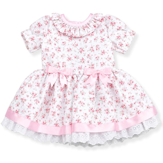 Floral dress with pink and white colors on a white background