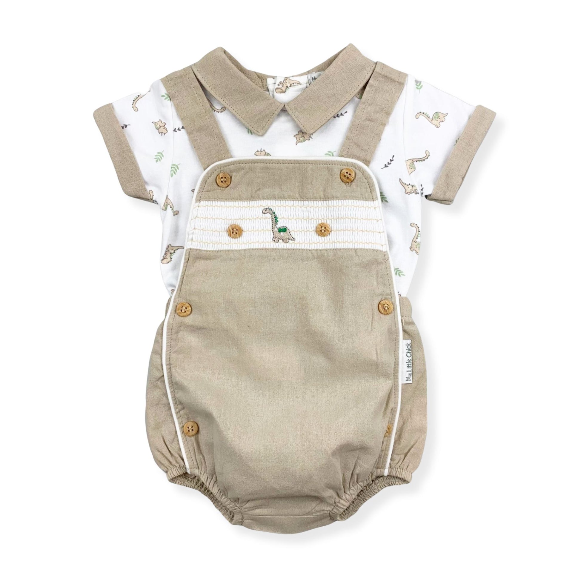 Baby romper with dinosaur pattern on a white background