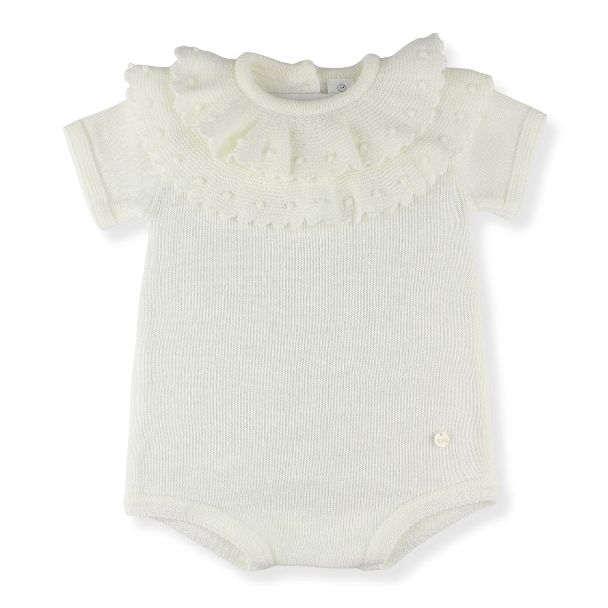 White baby romper with ruffled collar on a white background