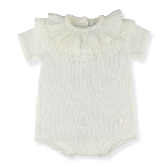 White baby romper with ruffled collar on a white background